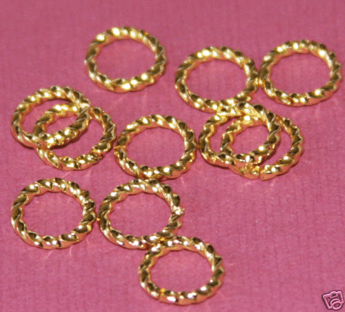 100 pcs of Gold plated brass Twisted jumpring 9mm