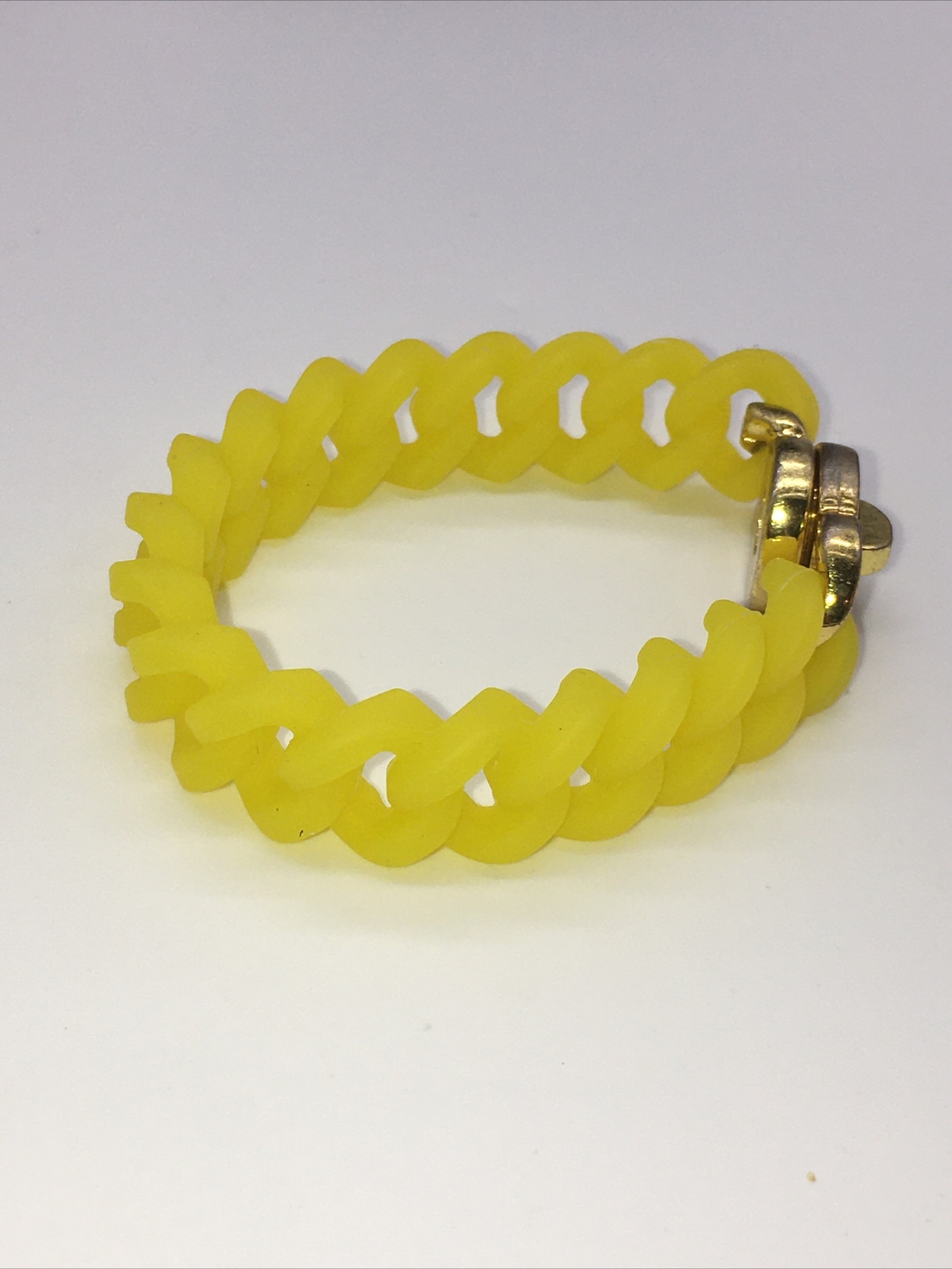 Rustic Cuff Gold Tone Logo Turn Lock Yellow Silicone Stretch Bracelet