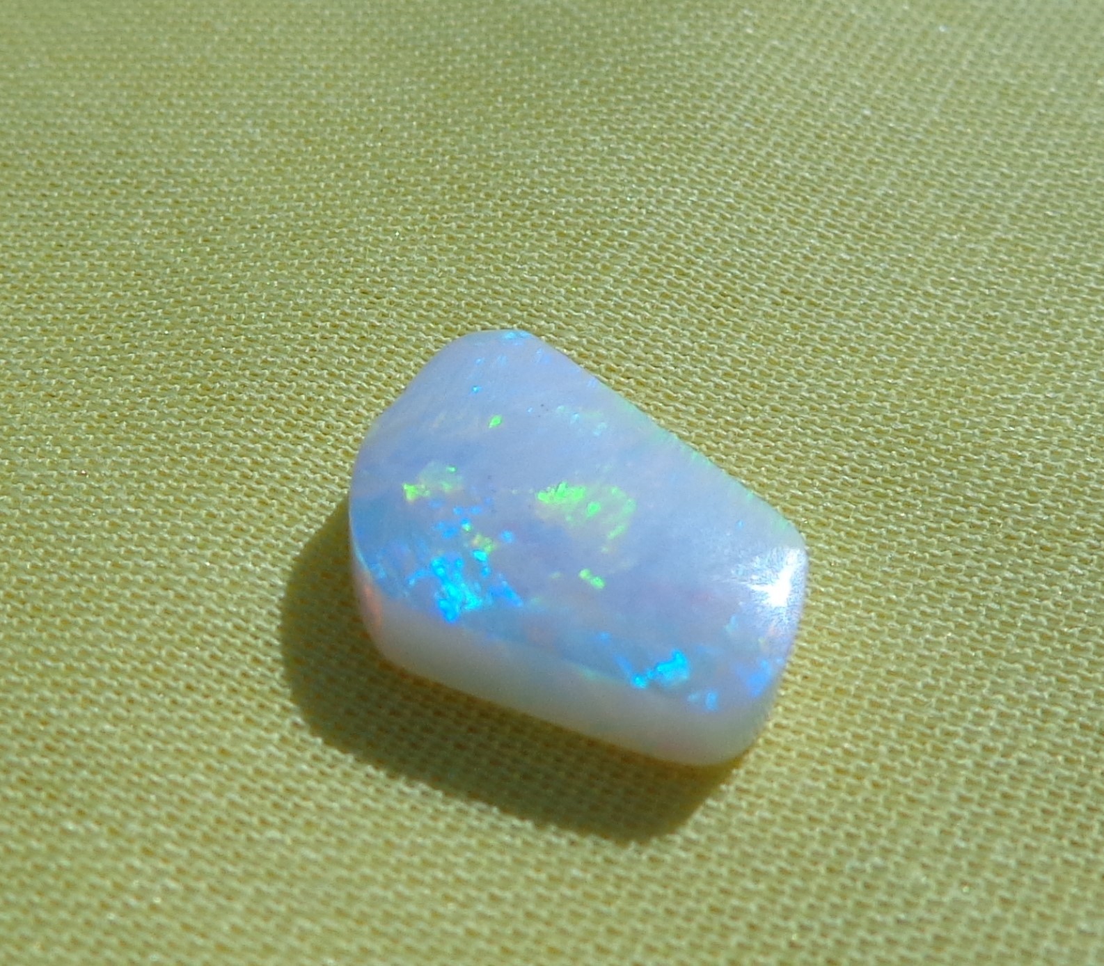 Spencer Idaho Opal Solid 9X15 mm with Unique Pattern and Red, Green, & Gold Fire