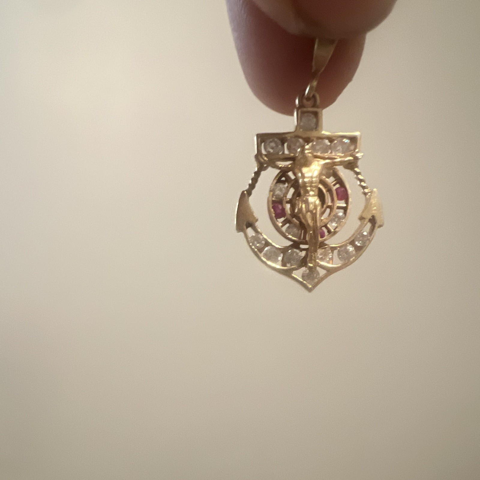 14 gold. Nautical Anchor Charm Pendant w/ Clear diamonds en ruby red. 5 grams