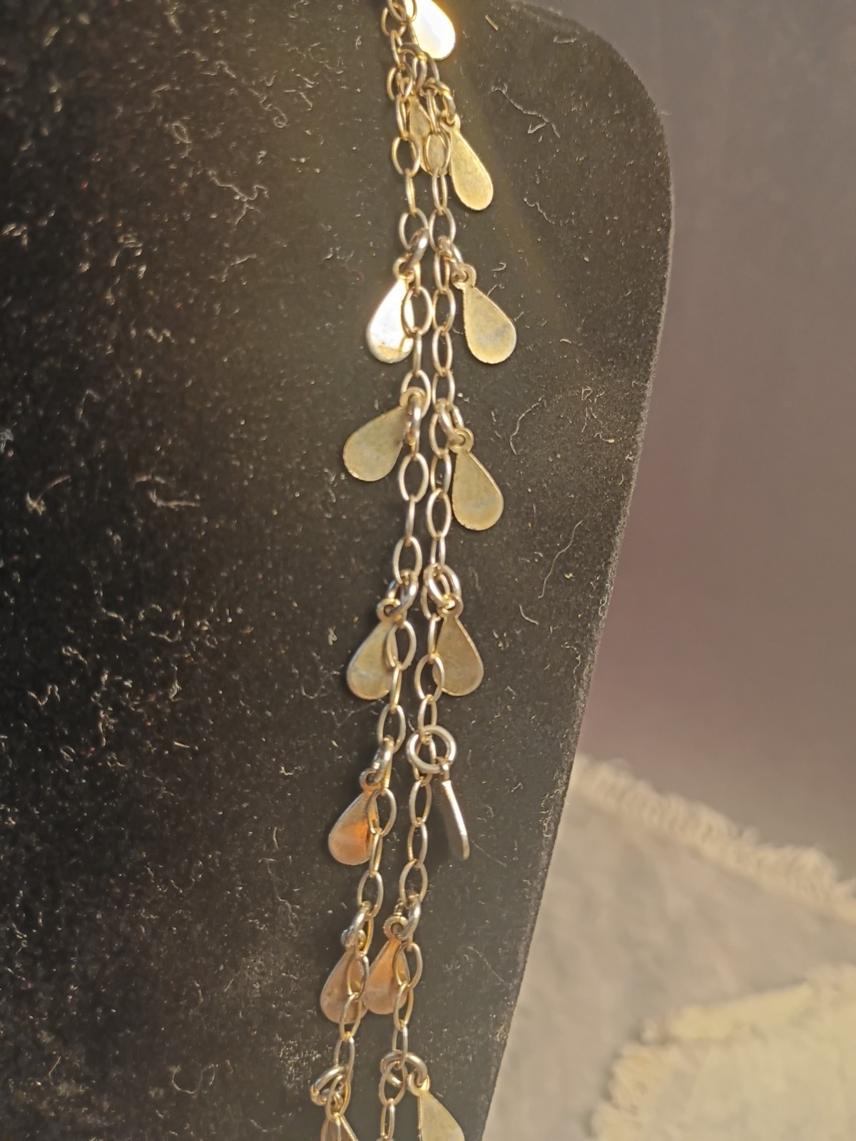 Gold Toned Tear Drop Charmed 56 Inch Taper Single Strand Necklace. J2