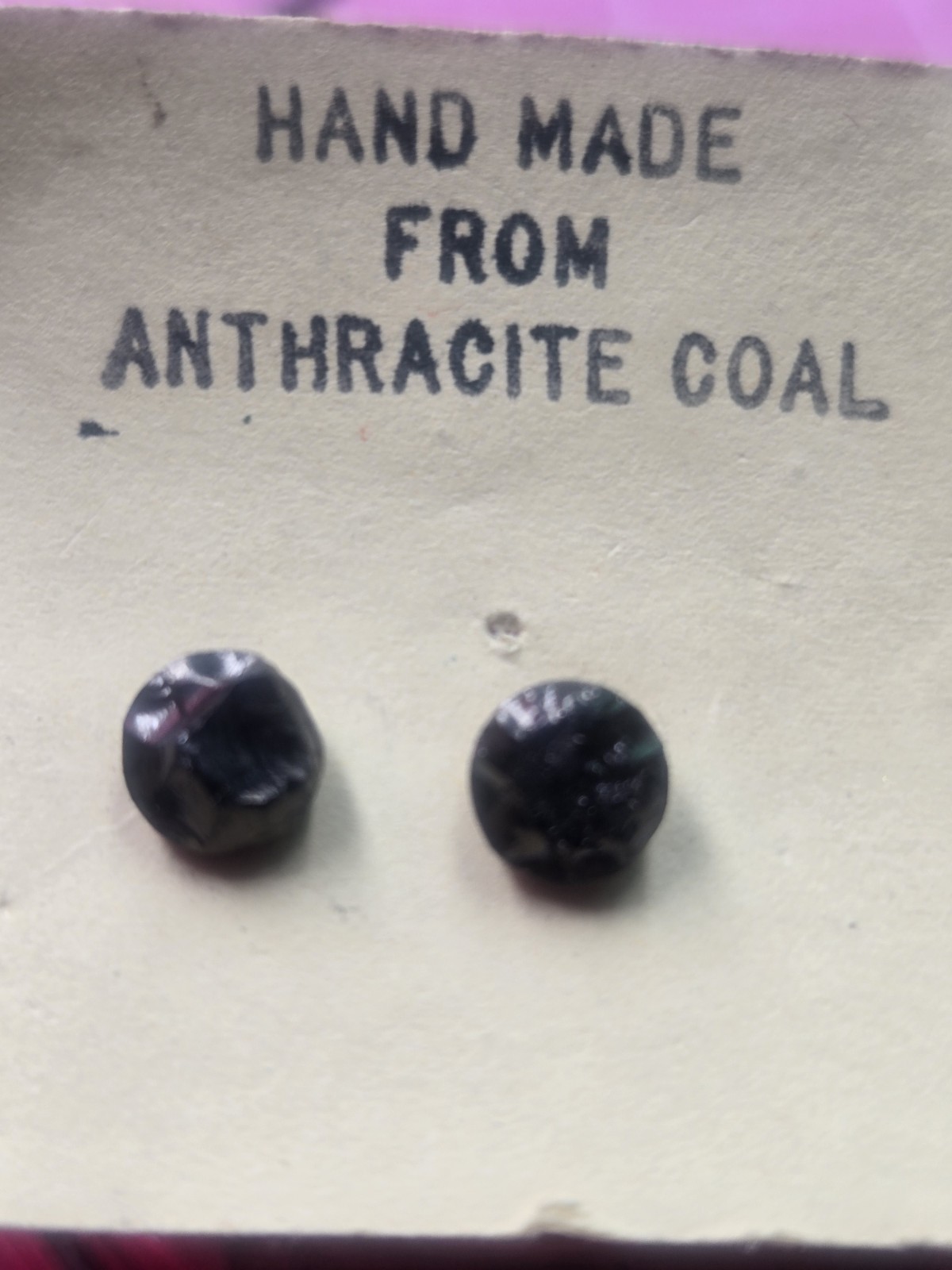 unique earrings are handcrafted from genuine anthracite coal, featuring a…