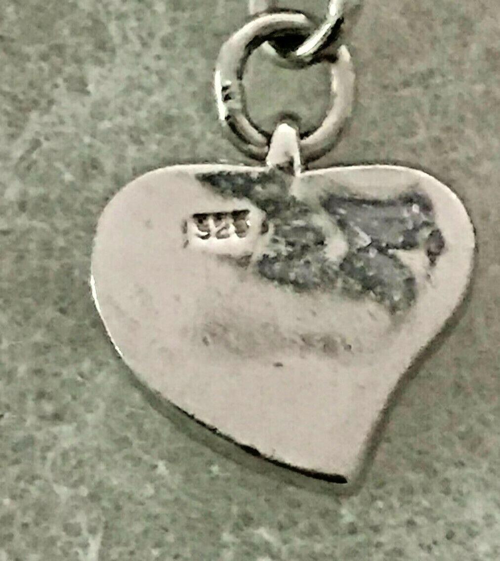Sterling Silver Oval Link Ankle Bracelet with Heart Charm 10 In. – 8.9 Grams