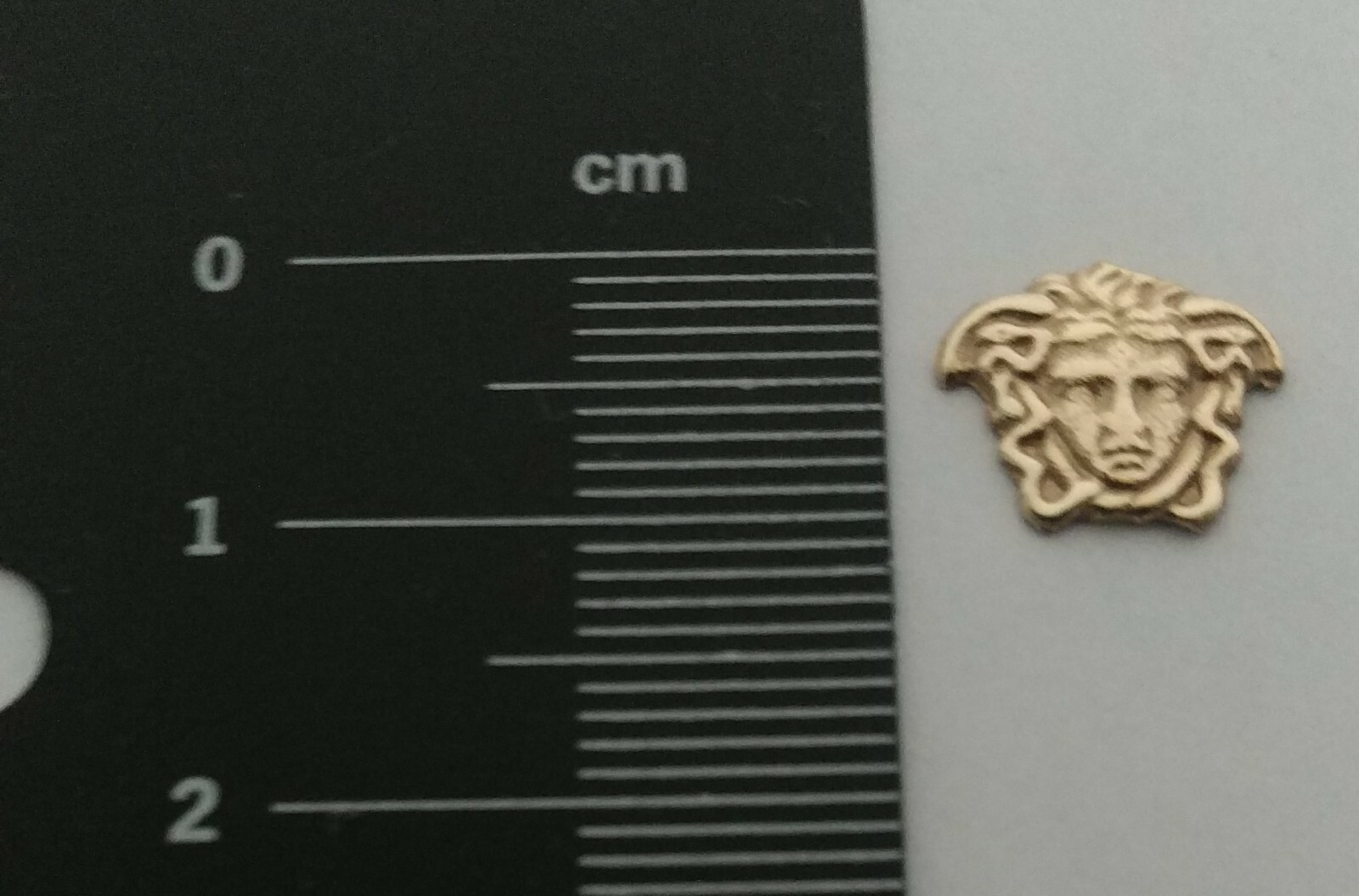 9 carat yellow gold 375, pair of large medusa head stud earrings