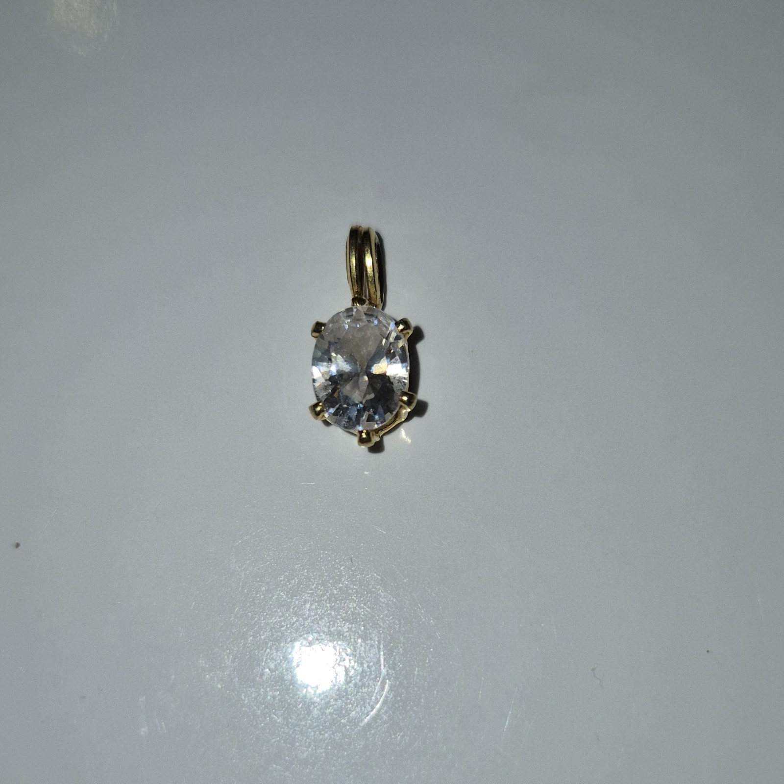 Yellow Gold Tone Oval Clear Simulated Cubic Zirconia Charm Pendant