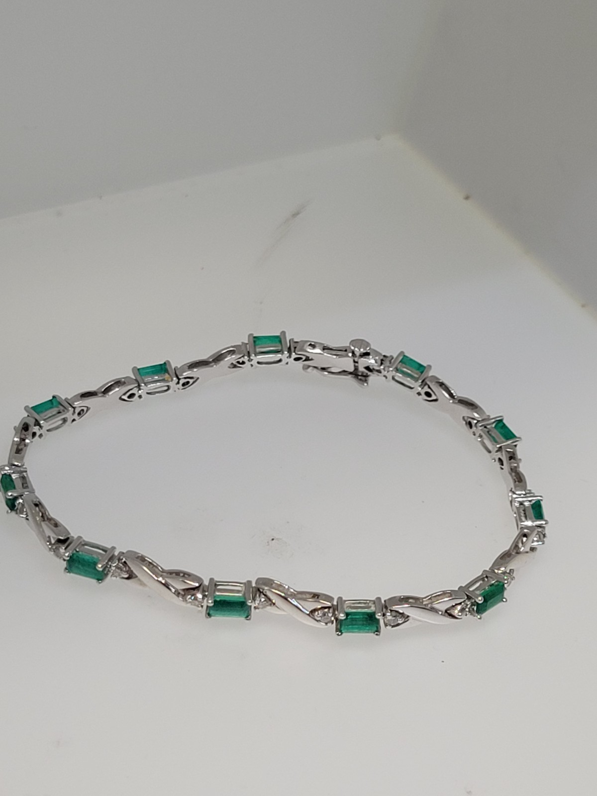 18k White Gold 3.3 cttw Gorgeous Emeralds and .63 cttw Diamond Bracelet