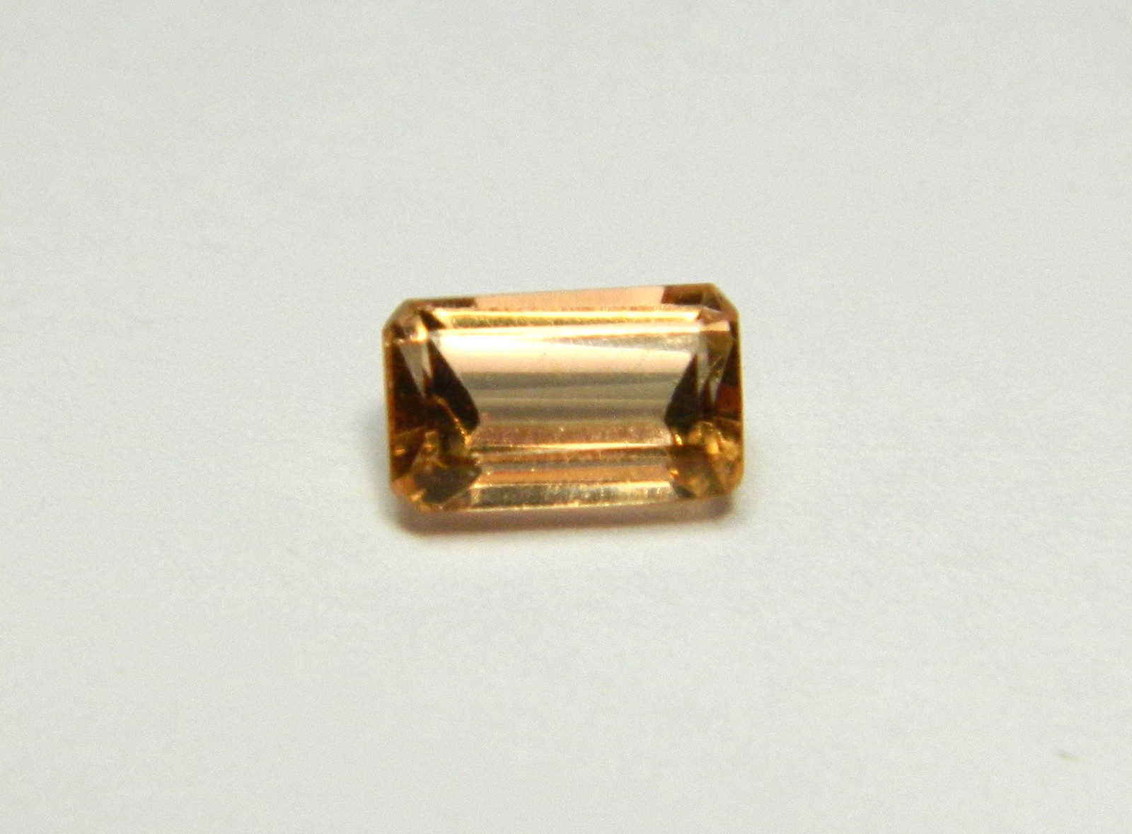 Imperial Topaz 0.64 Ct Clarity IF Emerald Cut Natural Peach Brazil I192