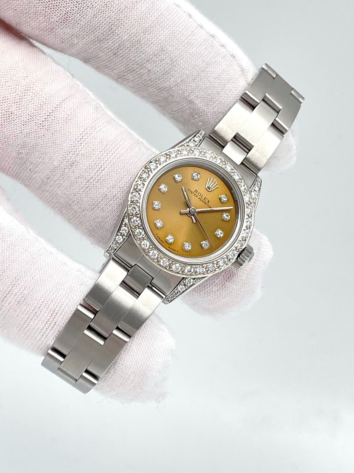 Rolex Oyster Perpetual 67180 24mm Salmon Dial Diamond Bezel Diamond Lugs Box