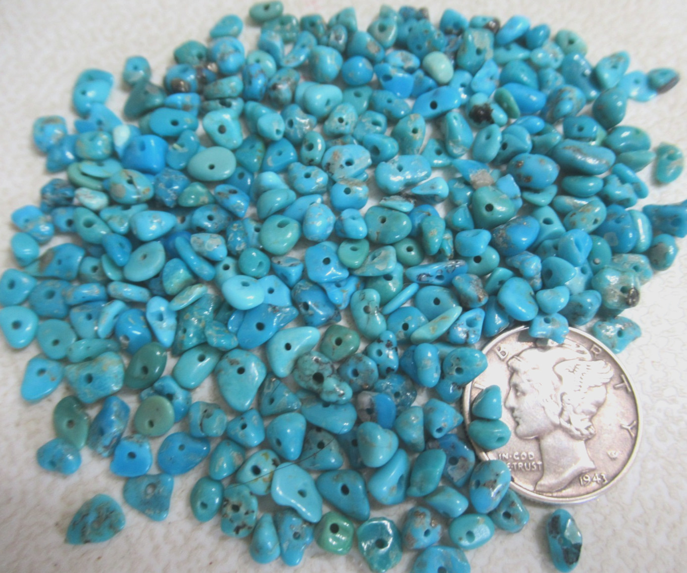 SLEEPING BEAUTY TURQUOISE 1/2 OZ SMALL DRILLED NUGGETS 3X2mm TO 6X4mm #765