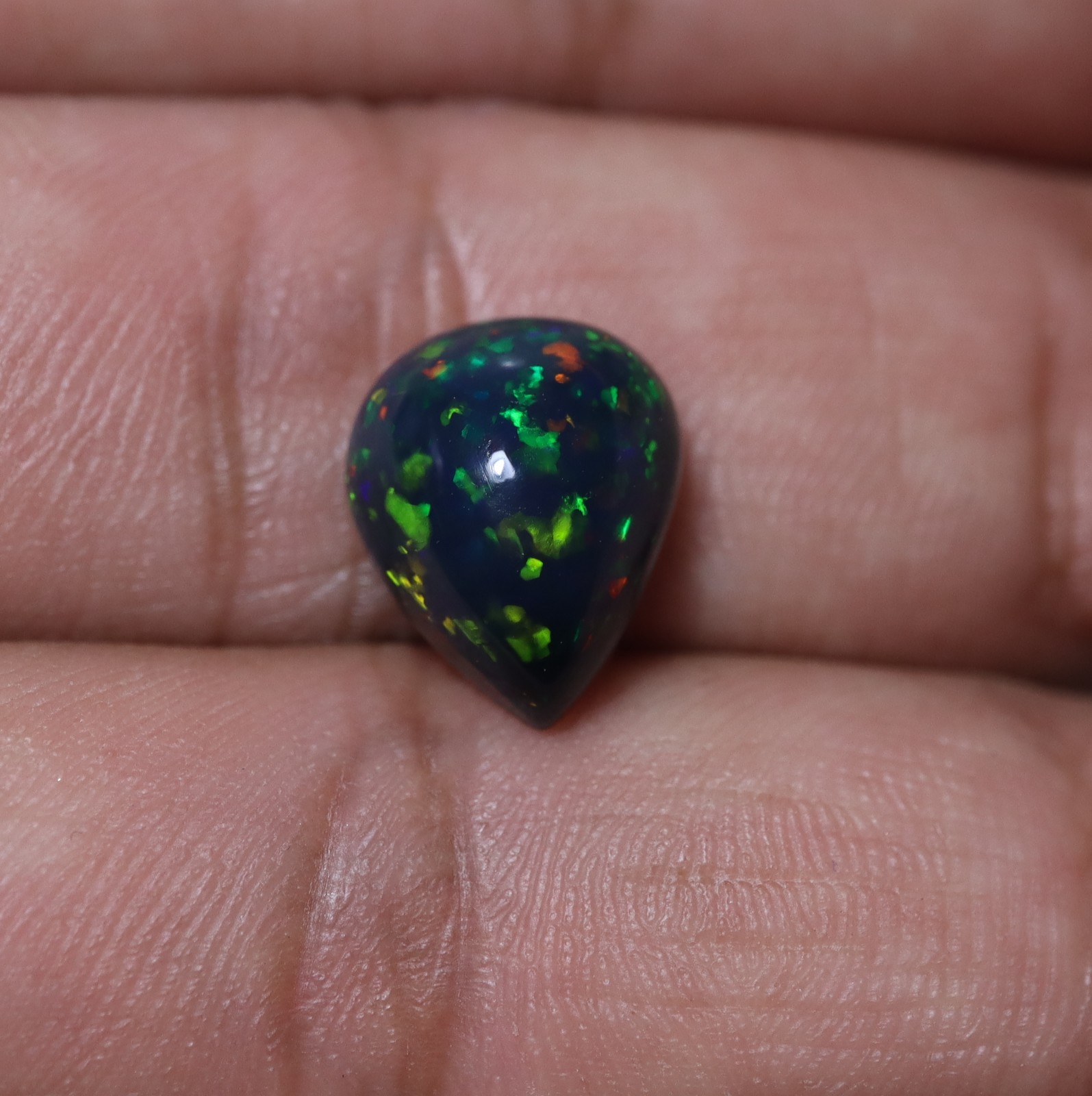 4.6Ct 13.2×10.6 MM Real AAA Multi Fire Smoked Black Ethiopian Opal Pear Cabochon