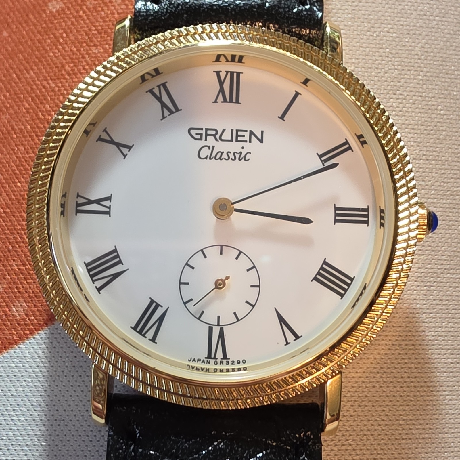 Gruen Classic Quartz Gold Tone Stainless Case White Roman Dial Black Leather
