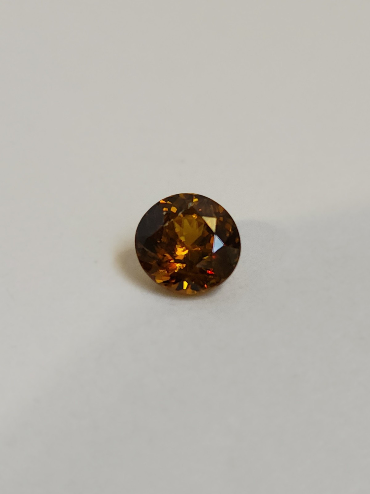 Sphene 7.18mm x 6.88mm x 4.30mm Oval 1.47ct Loose Gemstone