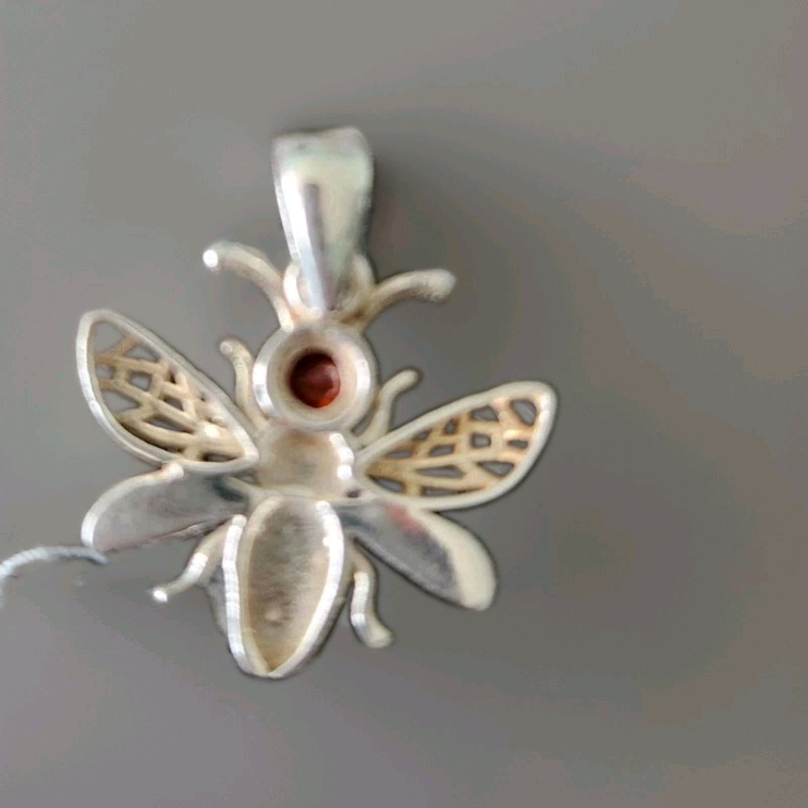 Silver and Orange Saphire bee pendant