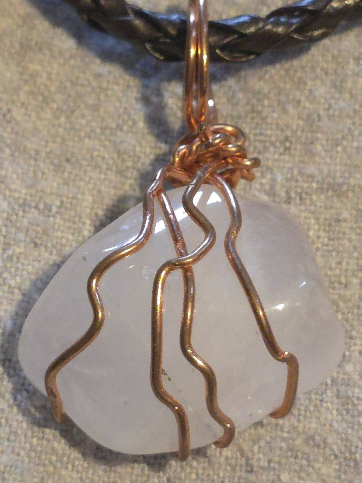 White Quartz Pendant On A Brown Leather Necklace