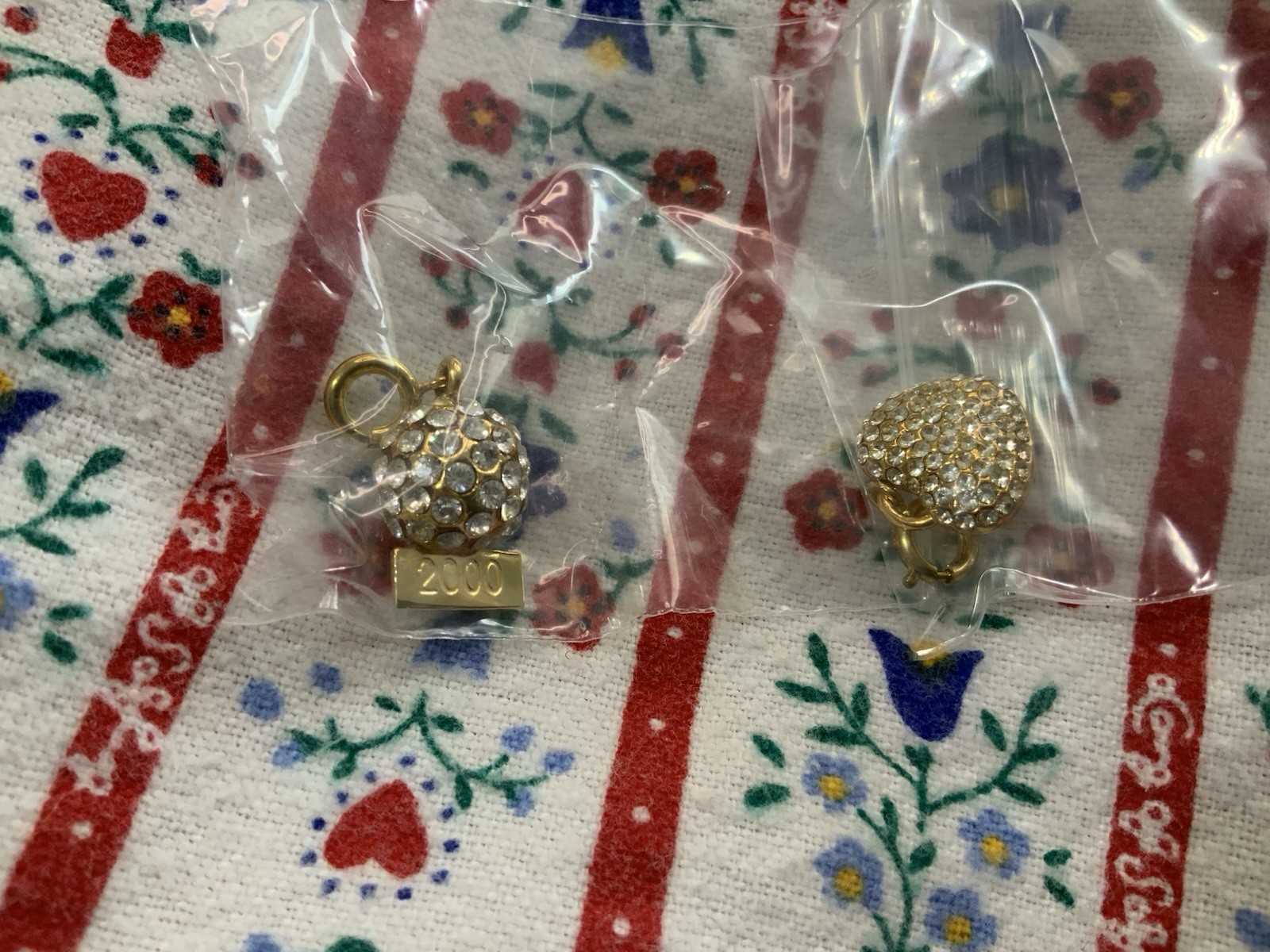 TWO Estee Lauder Charms Gold Tone NIB (Glittering Heart + New Year’s Ball)