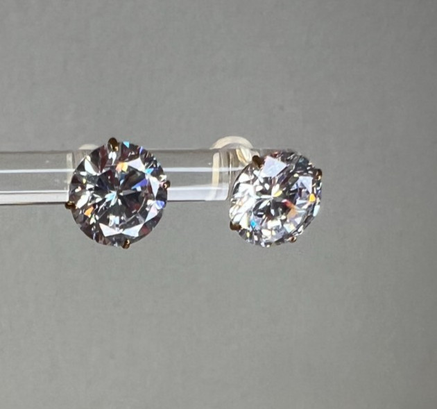 Bella Luce Cubic Zirconia 9.00ctw round 10K yellow gold stud earrings