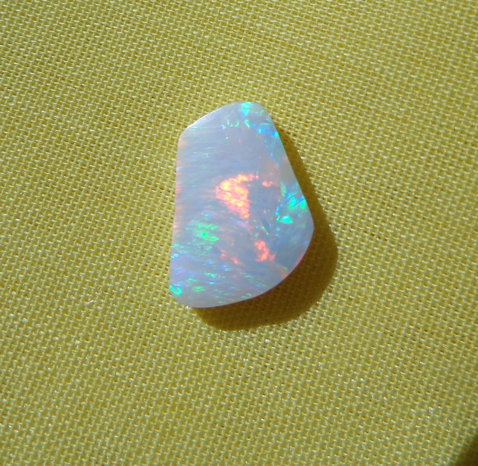 Spencer Idaho Opal Solid 9X15 mm with Unique Pattern and Red, Green, & Gold Fire