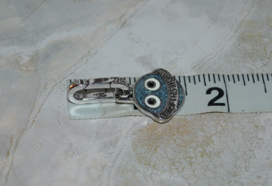 Henri Bendel out of this world charm