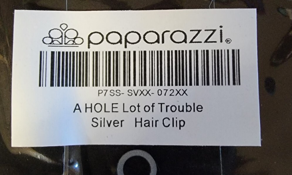 A Hole Lot Of Trouble Silver Paparazzi Hair Clip Accessory