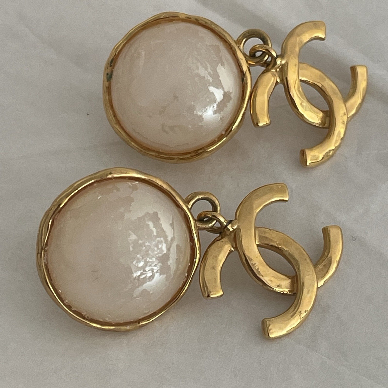 Auth. vtg CHANEL 1995 gold 3D CC logo dangle with round moonlight stone stamped