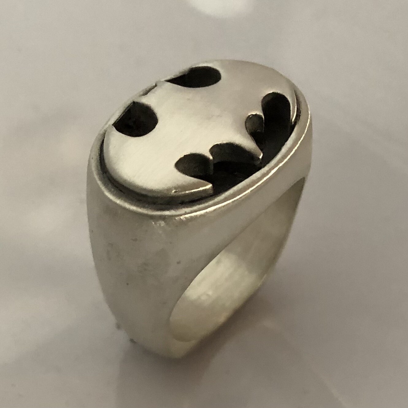 MJG STERLING SILVER OVAL BATMAN RING. STARTS AT SIZE 10