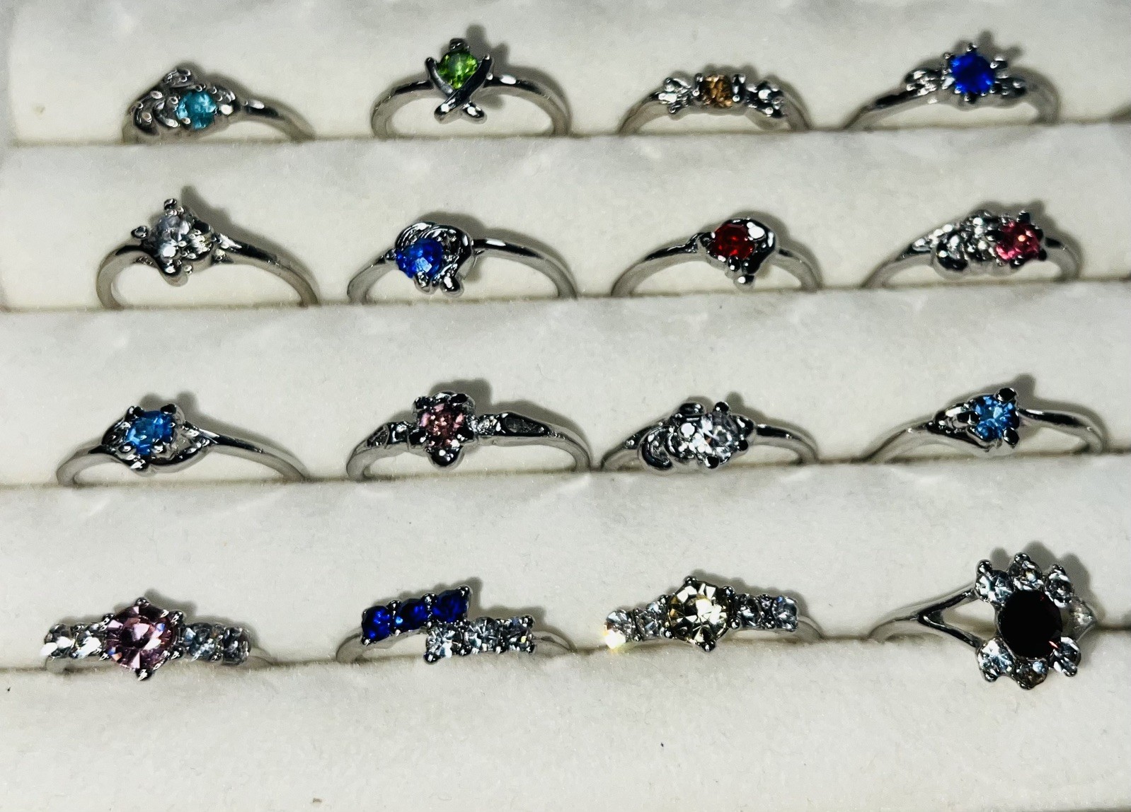 Bundle Of 50 Lovely Silver Coloured Rhinestone RINGS Single & Multiple Gem Stone