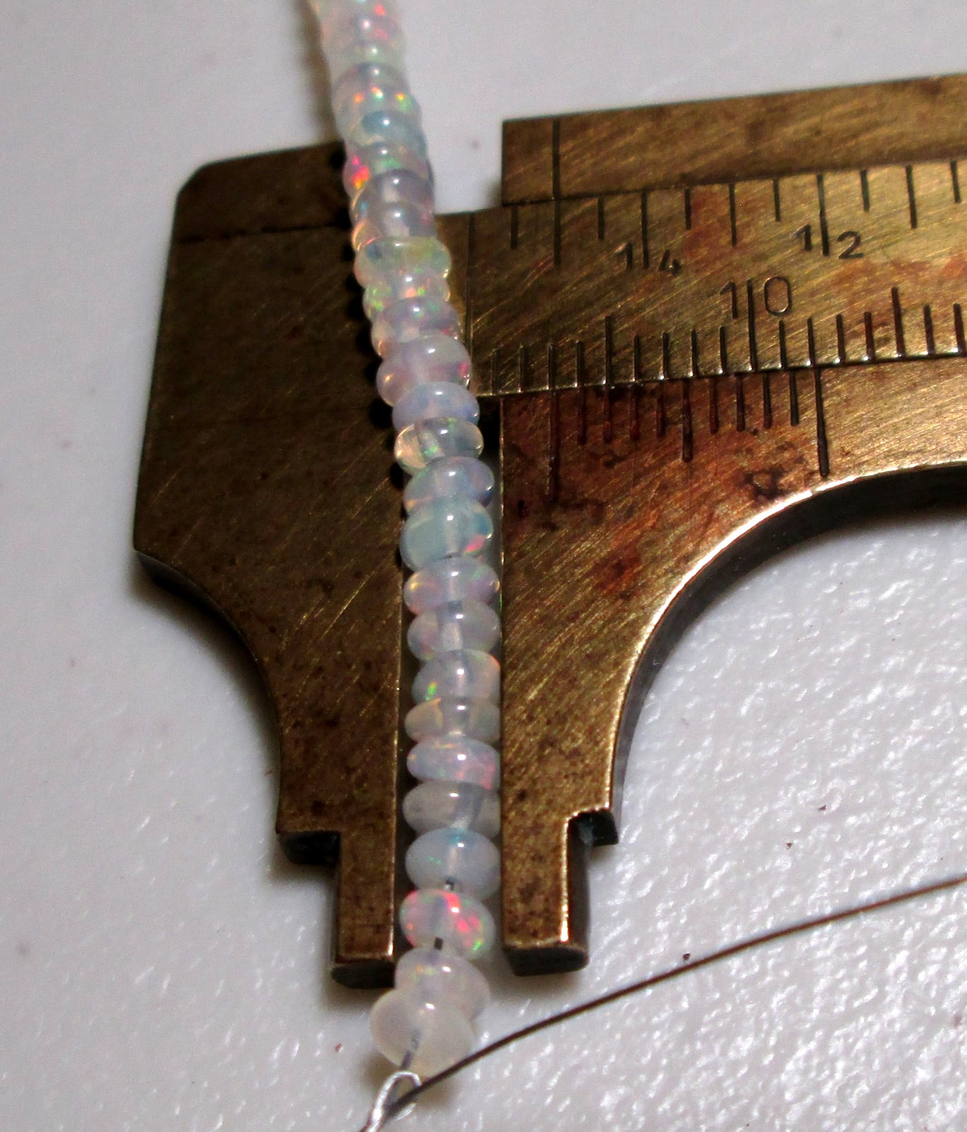 30.70 cts of Faceted Strands of Ethiopian Opal Gemstone Beads, TGS 20
