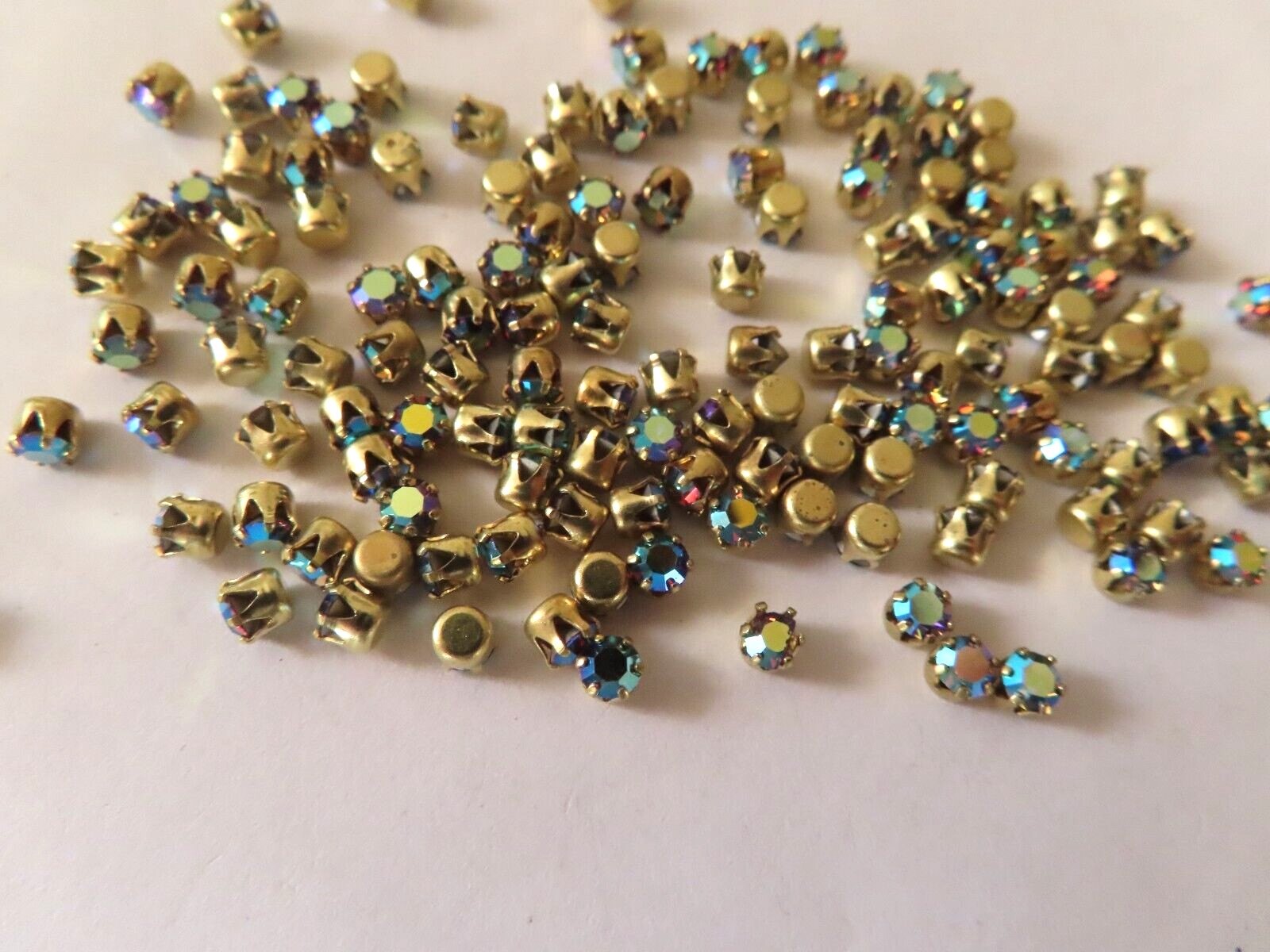 144 Swarovski Rhinestones 24pp Black. Diam. AB/Brass Tiff. settings.
