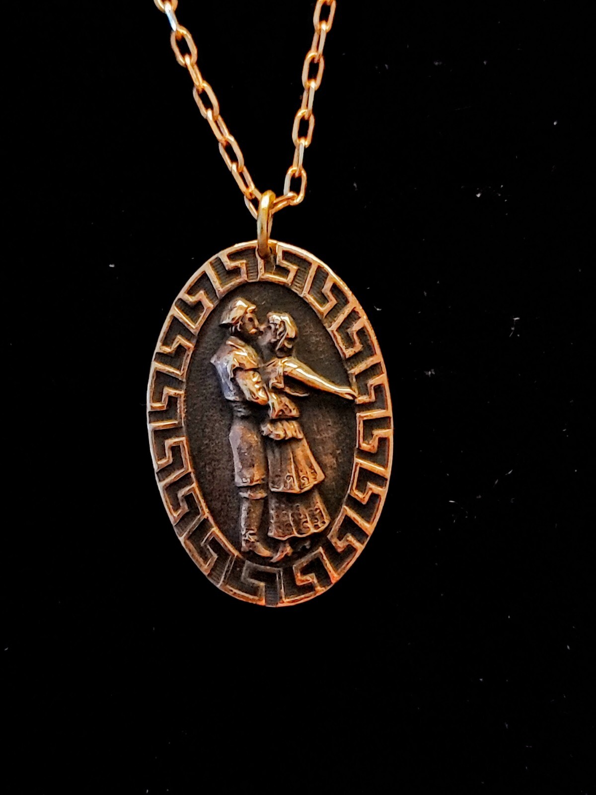 Vintage Couple Kissing Pendant Die Struck Necklace