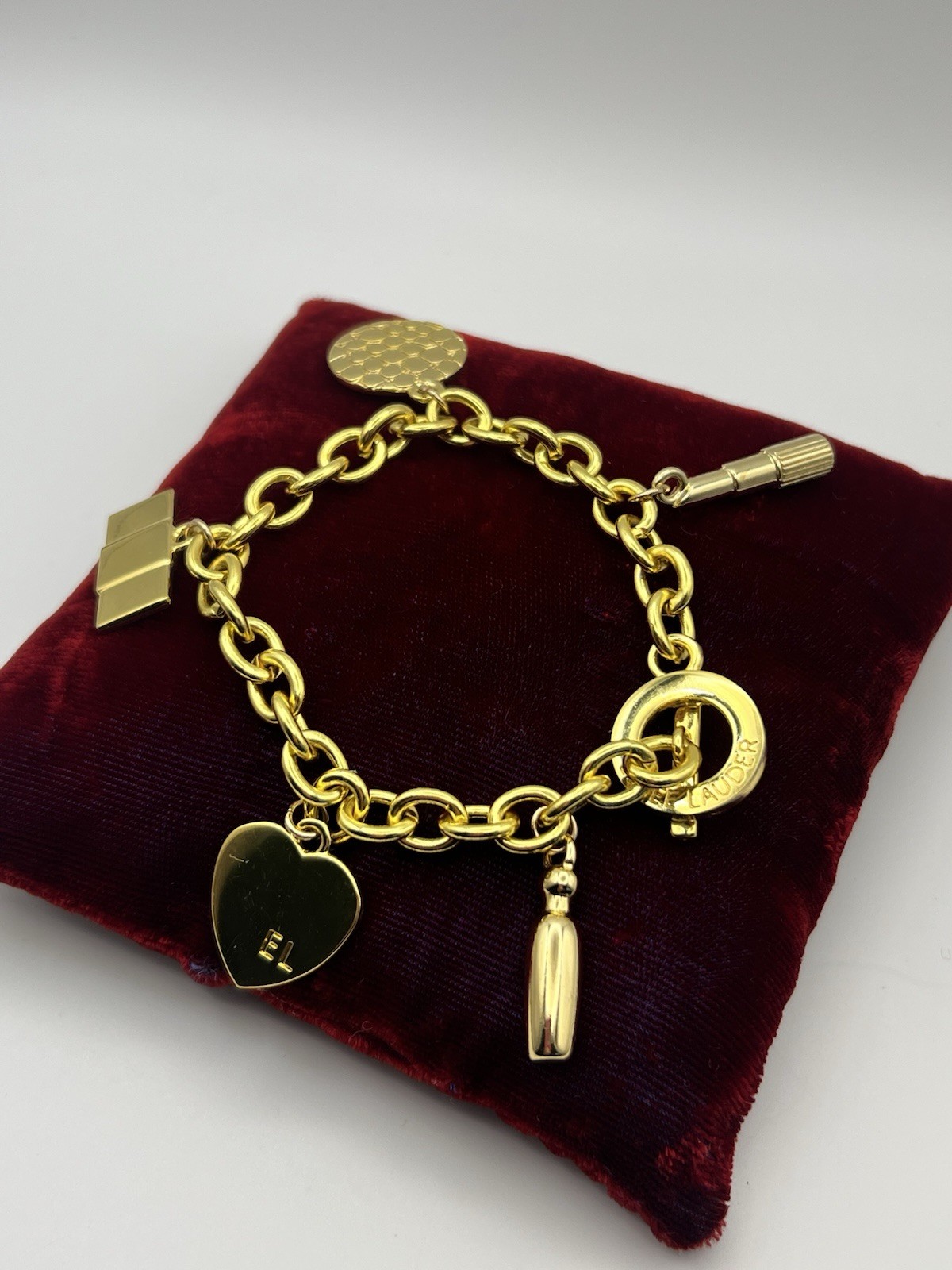 Vintage ESTEE LAUDER Runway Gold Tone Charm Bracelet Couture 7.5 ”