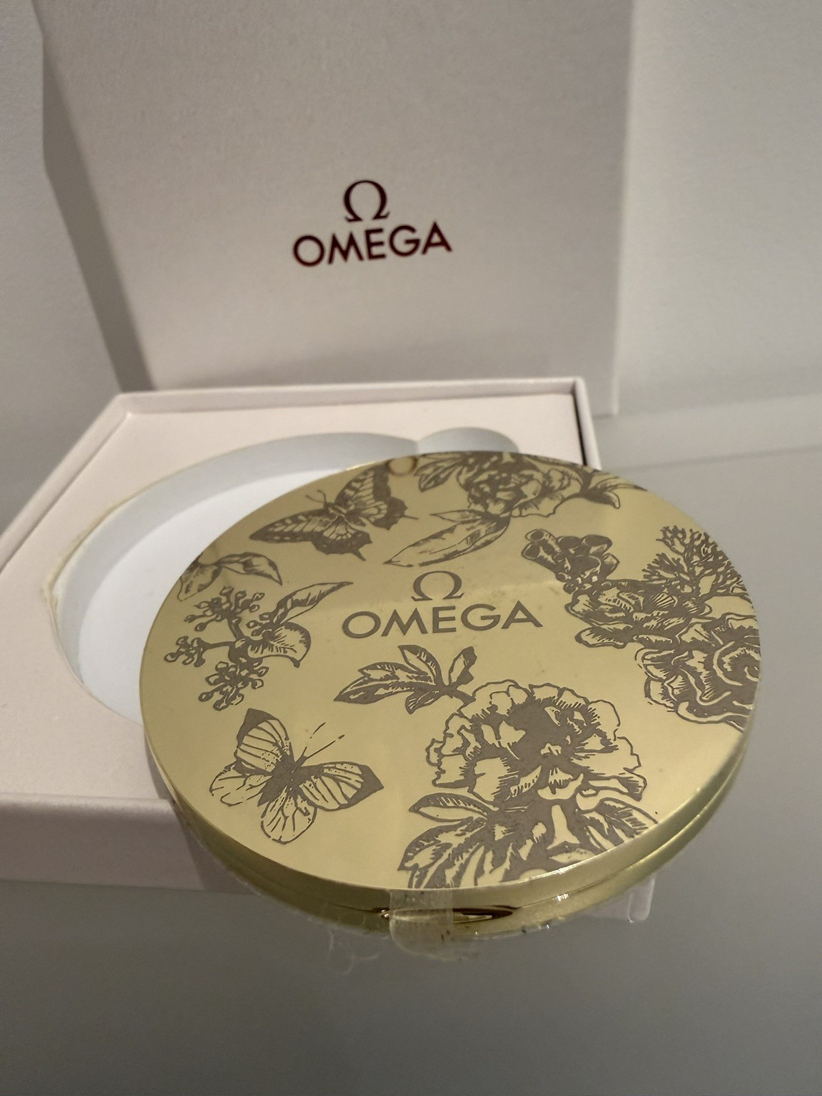 Omega Gold-Tone Compact Mirror – Floral & Butterfly Design
