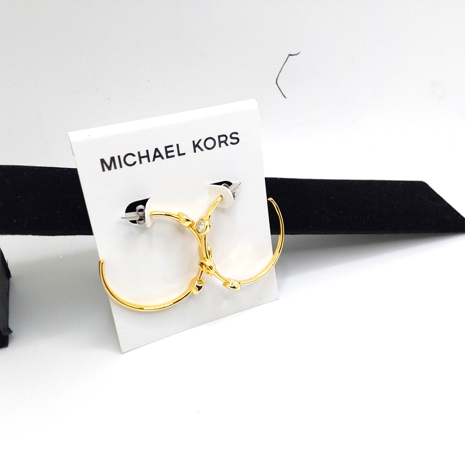 Michael Kors Evelyn Gold Tone Medium Open Hoop Earrings