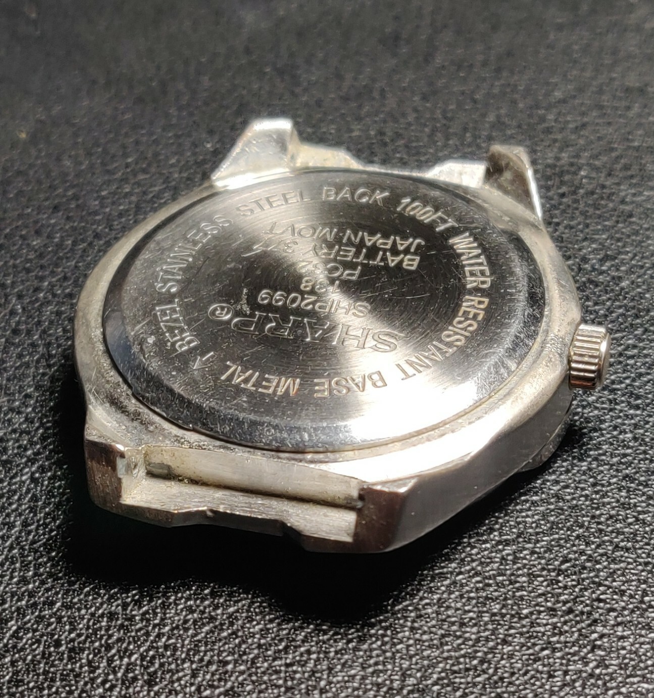 Sharp SHP2099 Silver Tone Seiko Instruments Inc. PC21A Quartz Movement No Band