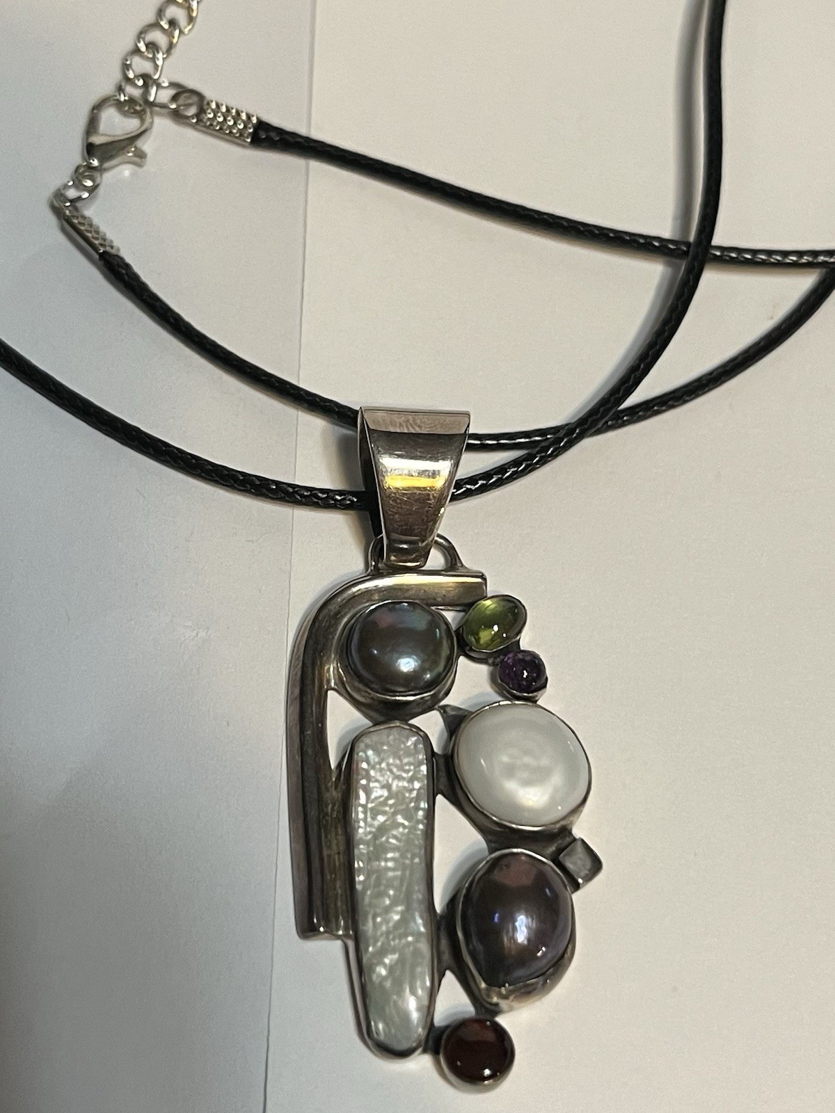 vintage style multi gem sterling silver pendant on 24 inch long black cord.new
