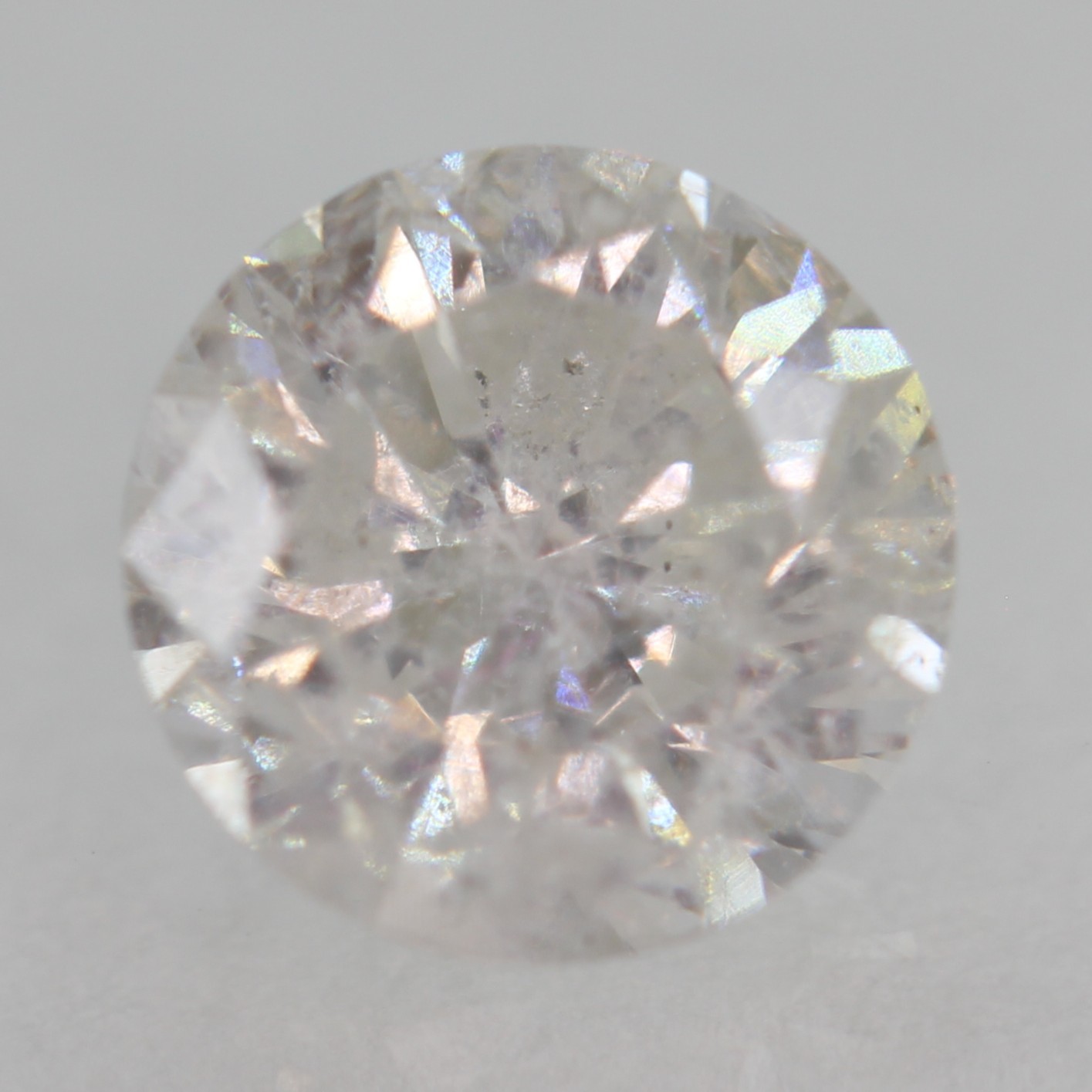 Certified 0.65 Carat E SI2 Round Brilliant Natural Enhanced MINED Diamond 5.37mm