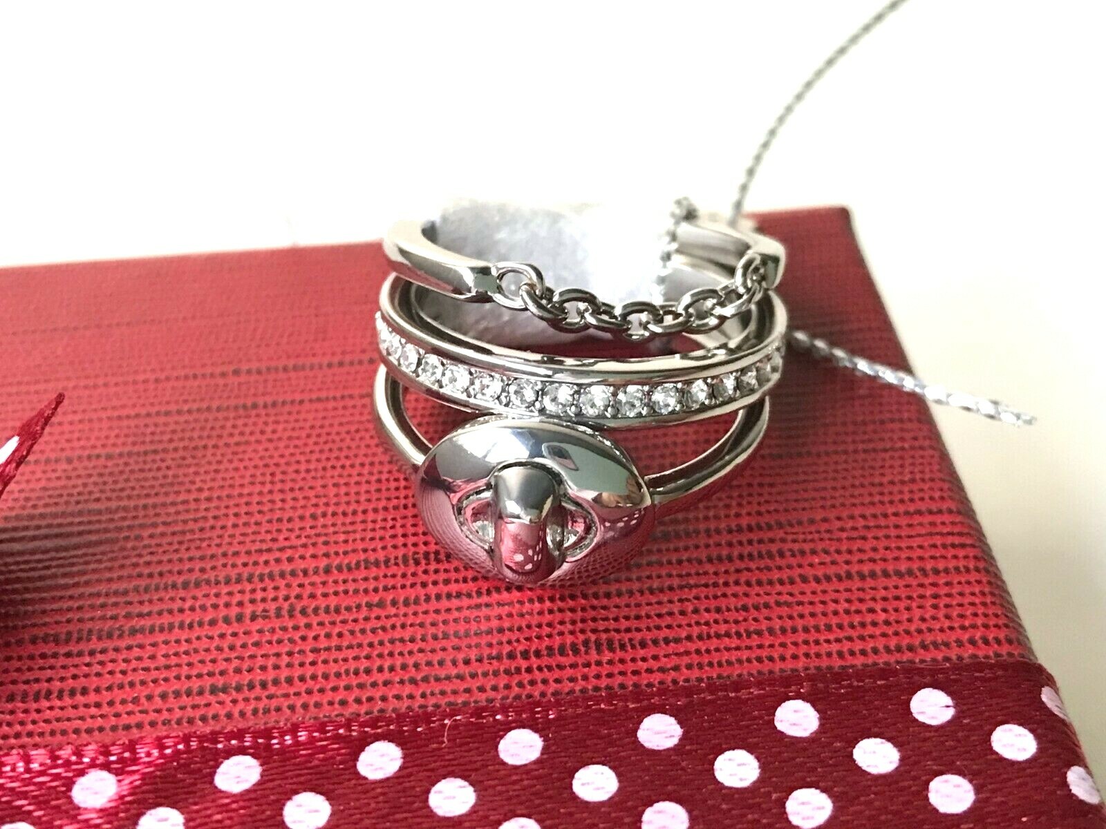 Coach pave turn-lock ring set