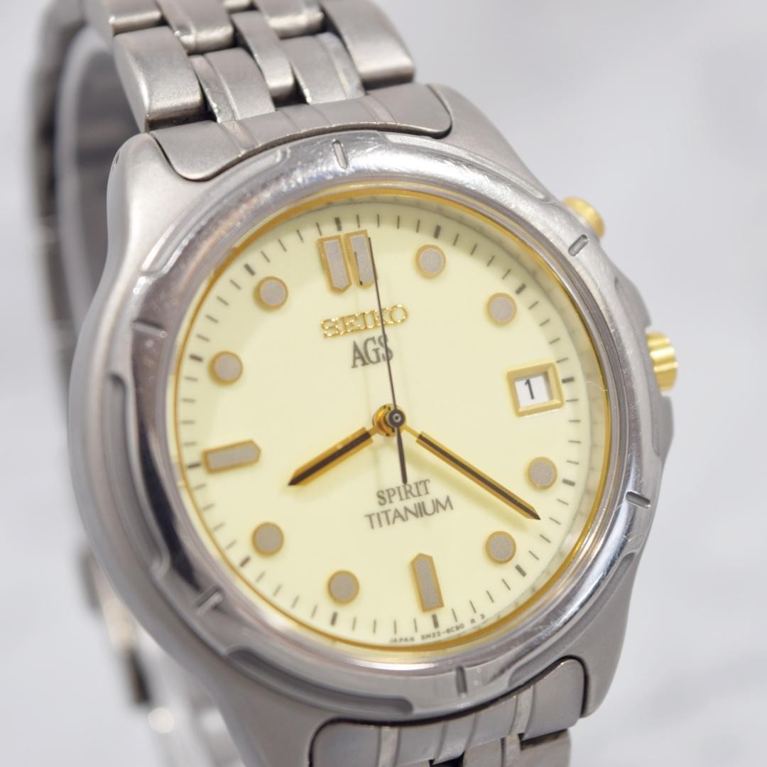 1996 SEIKO Spirit AGS Titanium watch with date display, non-functional.
