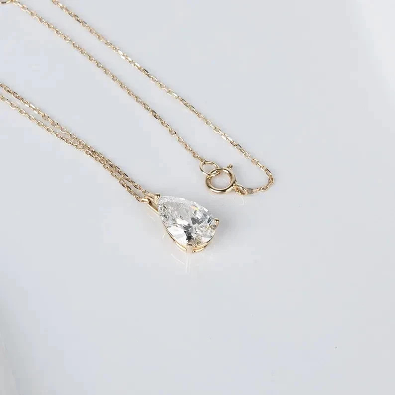 2CT Pear-Cut Moissanite Solitaire Pendant 14K Yellow Gold Plated 18″ Chain