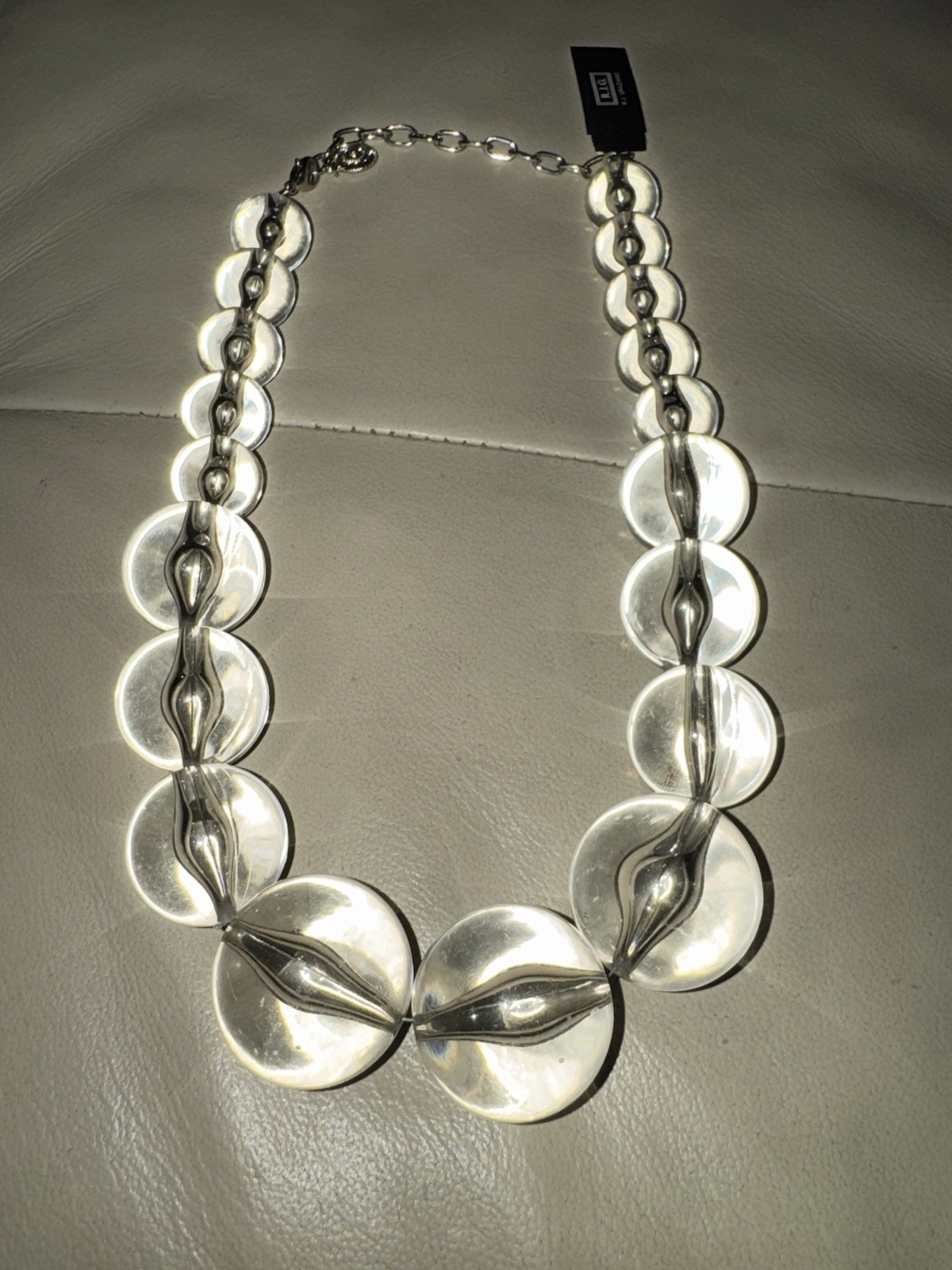 R.J.G. (RJ Graziano) Clear Acrylic Disc Beaded Statement Necklace Adjustable