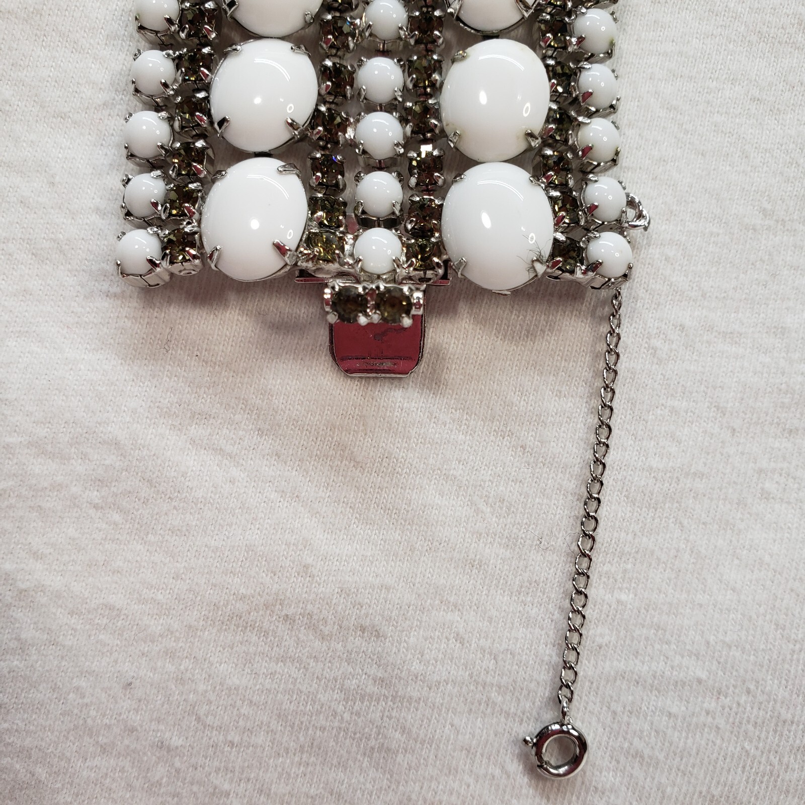 Milk Glass Bracelet With Crystal Rhinestones, 9 Rows. 7in Long 2in Wide
