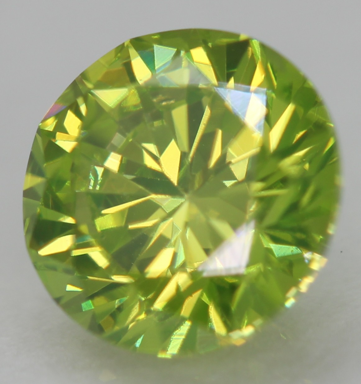 Cert 0.65 Carat Vivid Green VVS1 Round Brilliant Natural Enhanced Diamond 5.52mm