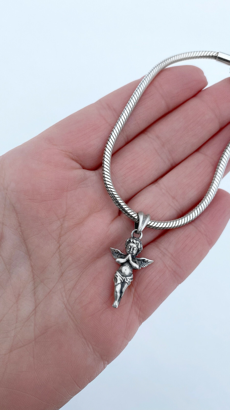 Angel. Pendant. Sterling silver,oxidised.