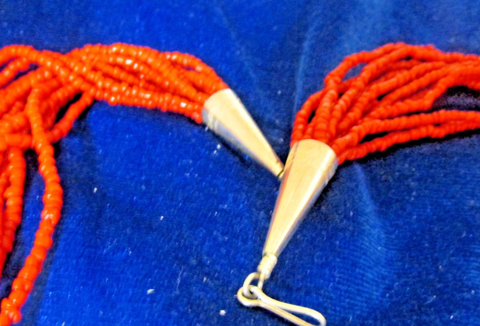 VINTAGE SOUTHWEST N.A, 10 STRAND CORAL NECKLACE, WITH ASSORTED FETISHES