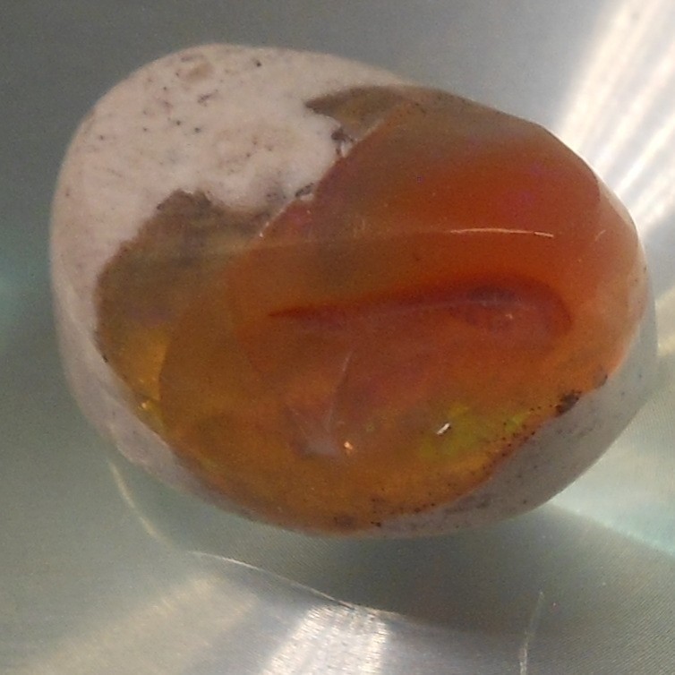 8.70 carats Mexican Fire Opal Freeform shape 15x11x8mm (approx)