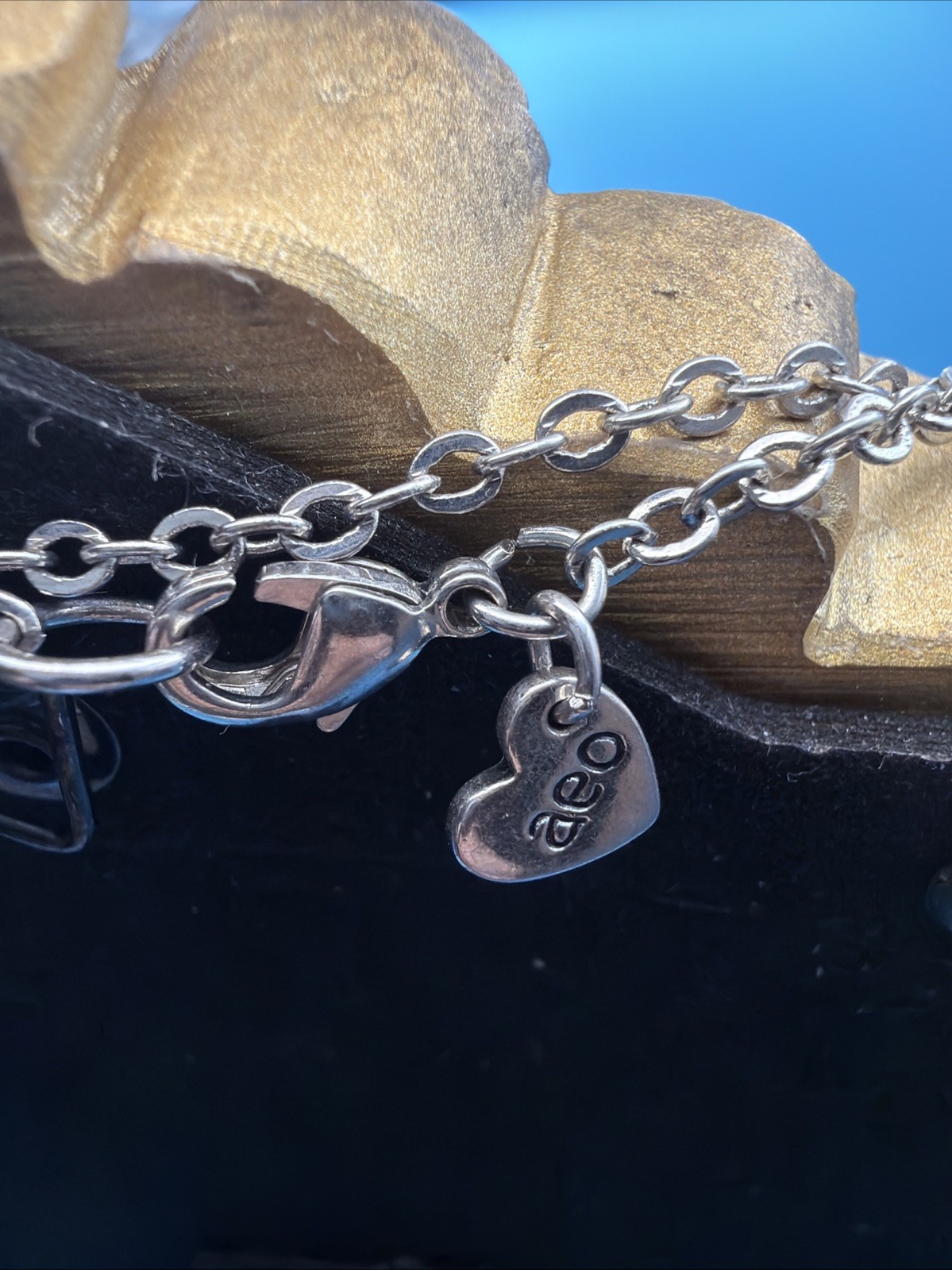 1046. American Eagle Station Necklace Silvertone Oval, Discs, Circles