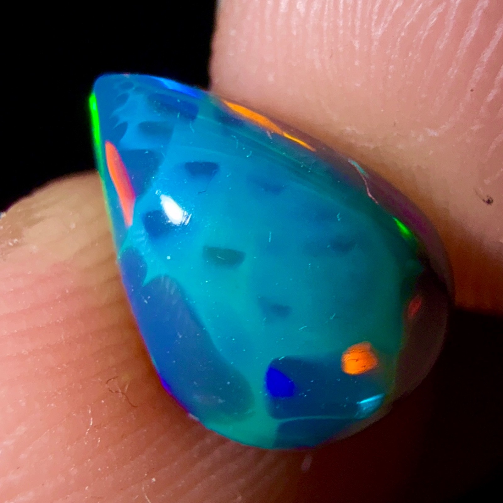 opal gemstone, Natural black fire opal, Ethiopian opal cabochon 1.85 Ct 10×7 mm