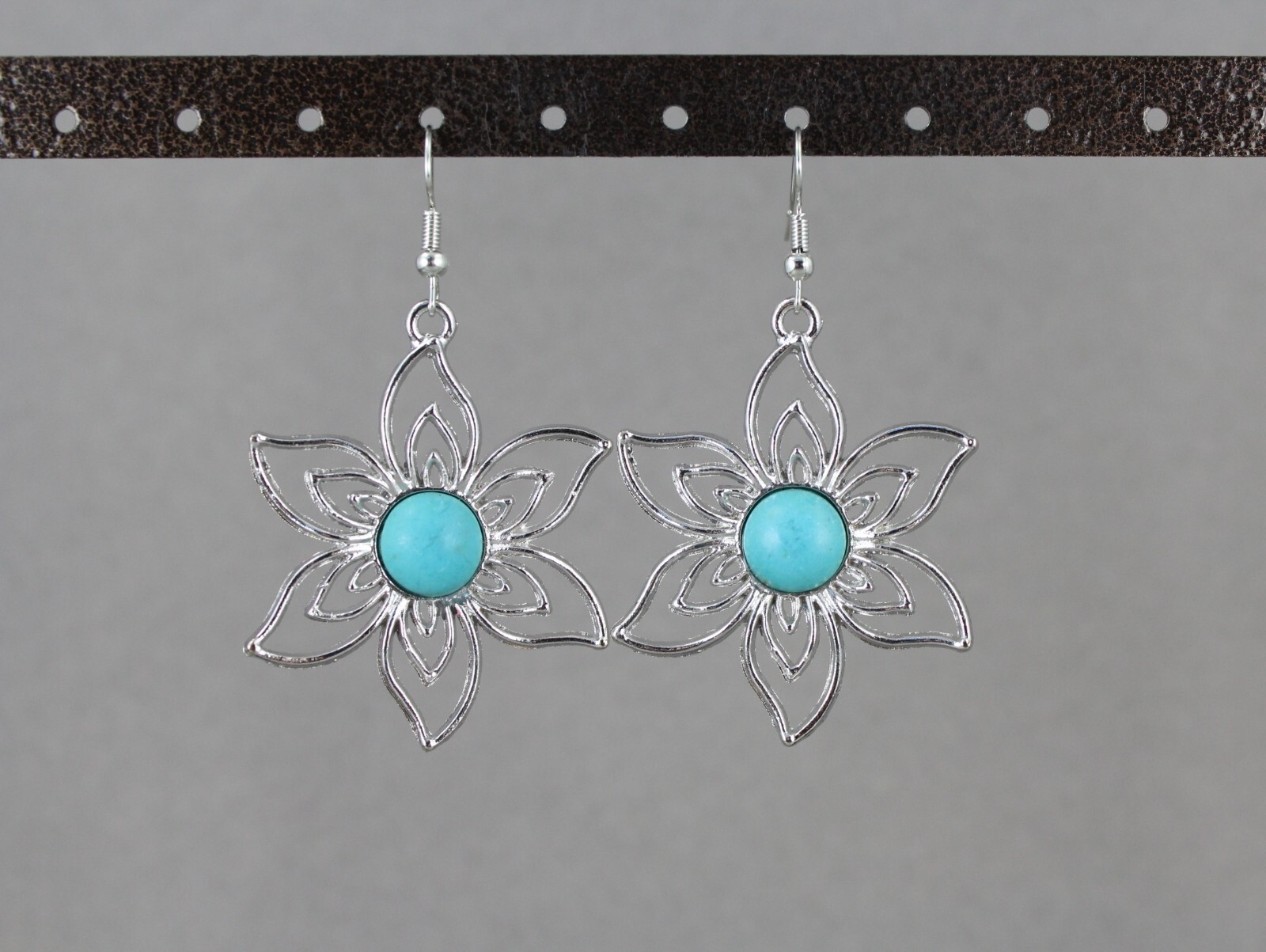 turquoise silver earrings lightweight flower outline dangle 2 3/8 long stamped