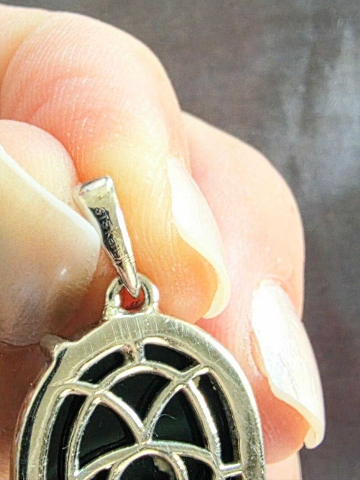 Sts Karis Vine Wrapped Black Onyx Oval Pendant
