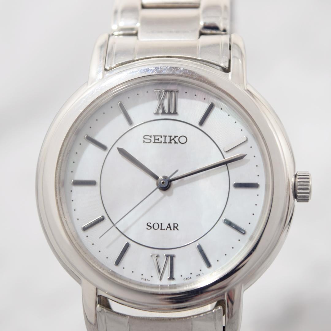 Excellent , SEIKO solar watch with mother-of-pearl dial, unisex. From Japan