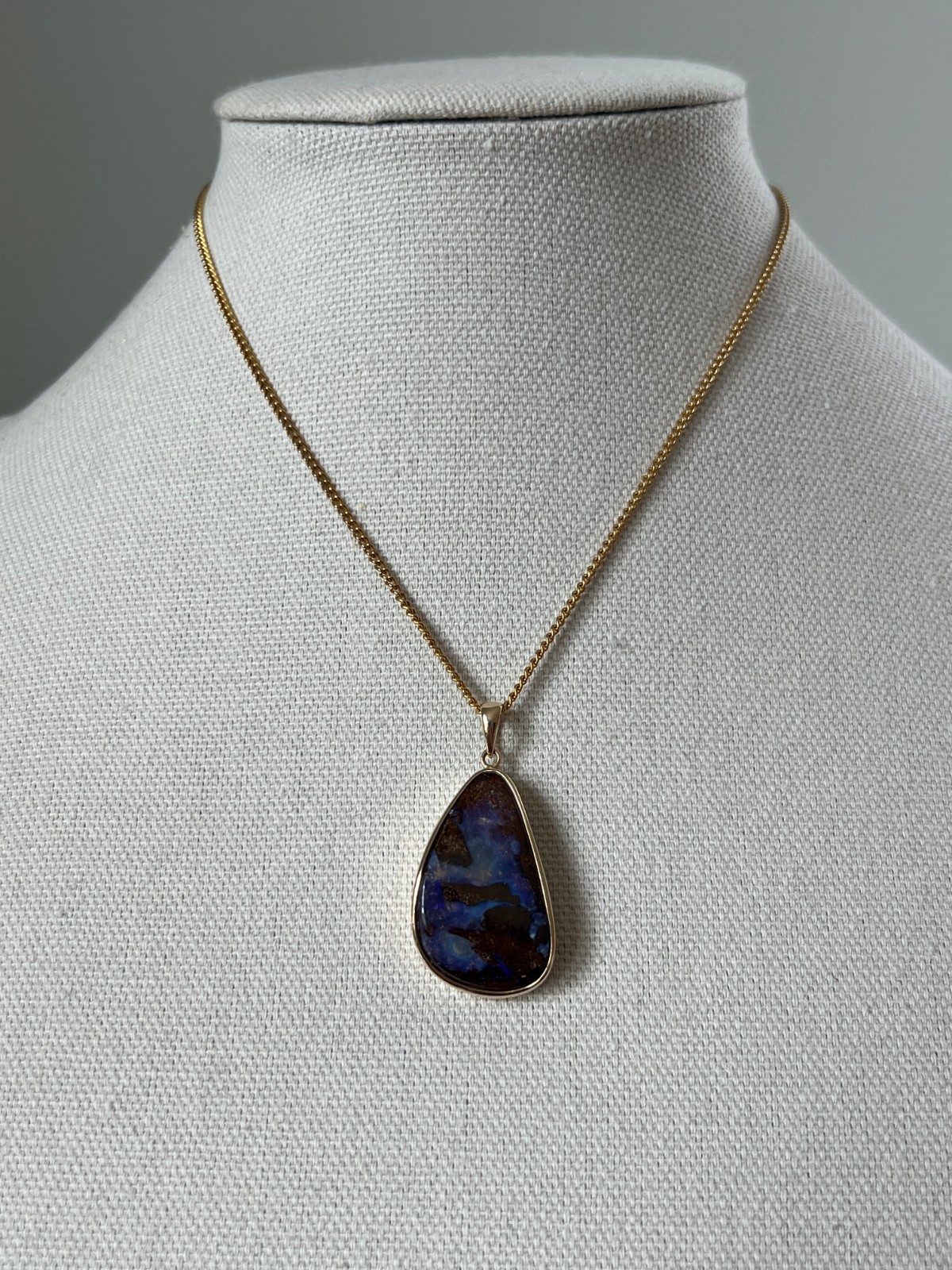 Contemporary 14 Karat Yellow Gold Freeform Oval Blue and Brown Opal Pendant